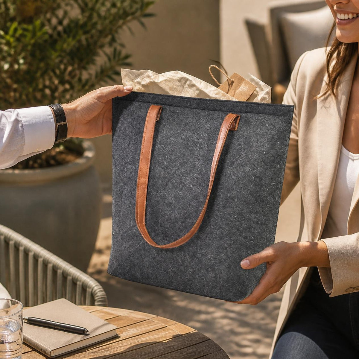Charcoal Bellagio wool tote handed over as a corporate gift