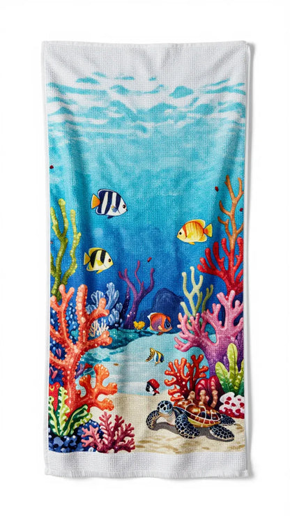 Towel with an underwater scene featuring fish and coral