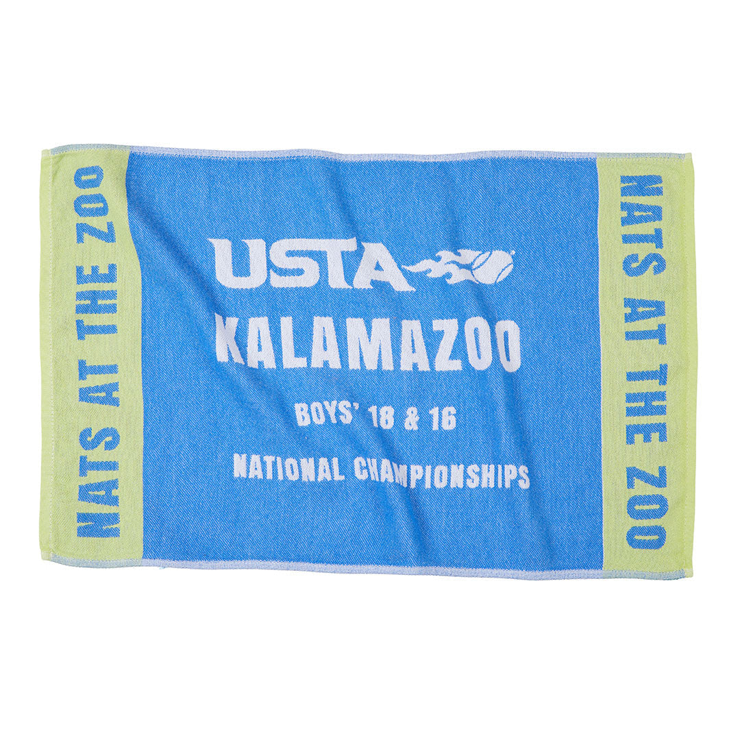 custom woven jacquard sport Towel with USTA Kalamazoo branding and text on a blue and green background