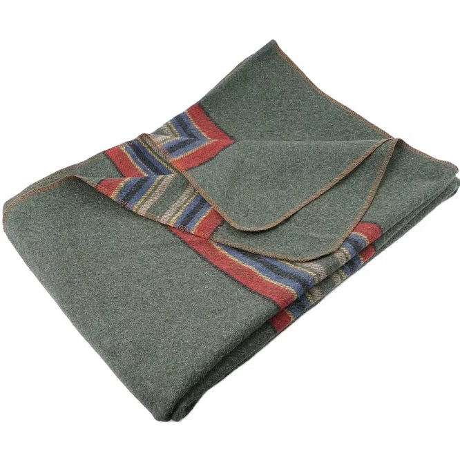 Folded green blanket with red and blue pattern on a white background