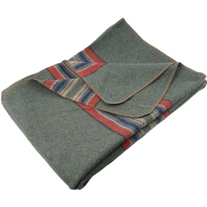 Folded green blanket with red and blue pattern on a white background