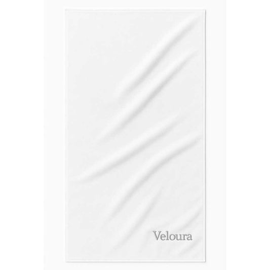 White terry velour cotton towel with 'Velour' logo embroidered  text on a white towel. 
