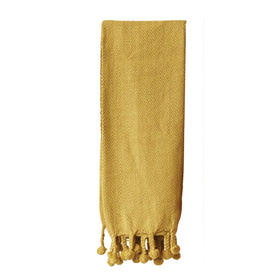 Throw with Braided Pom Pom Tassels in Gold